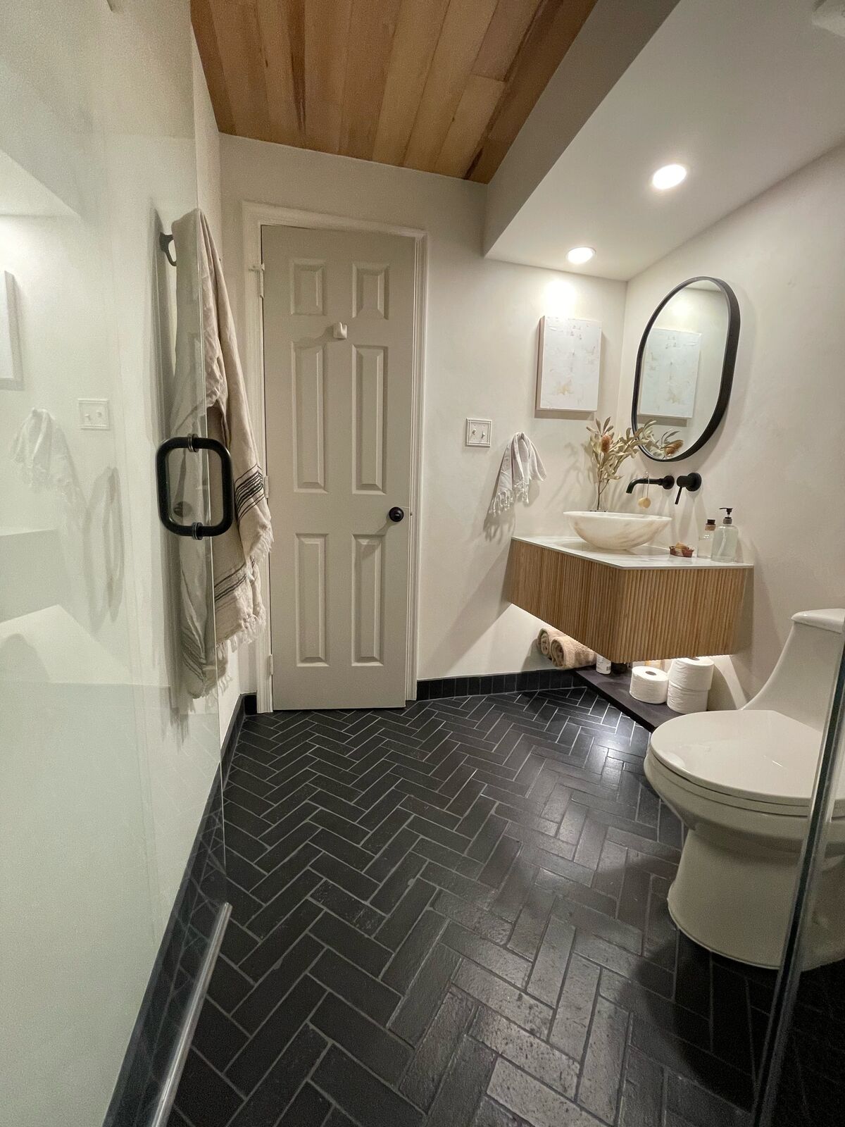 Black Hills Glazed Thin Brick Bathroom Floor | Fireclay Tile