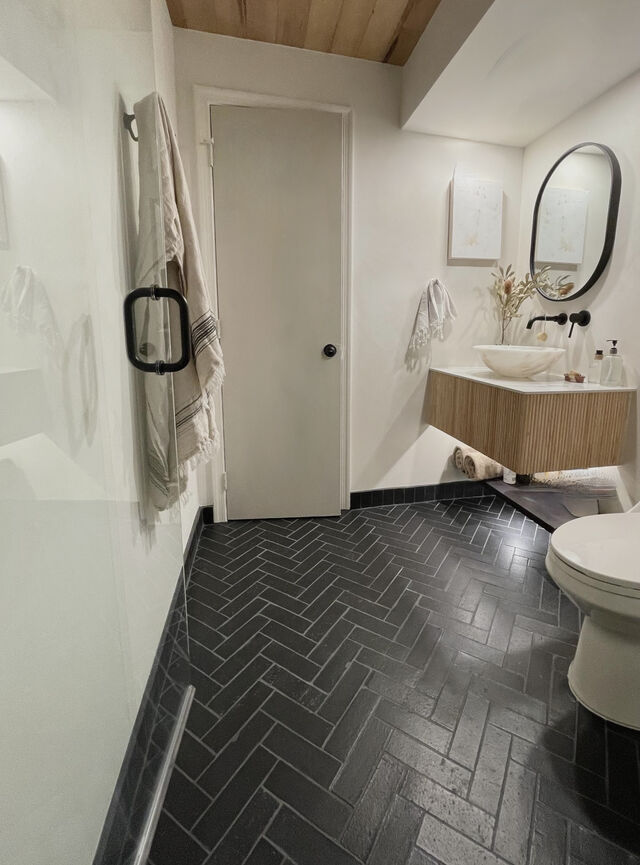 Black Hills Glazed Thin Brick Bathroom Floor | Fireclay Tile